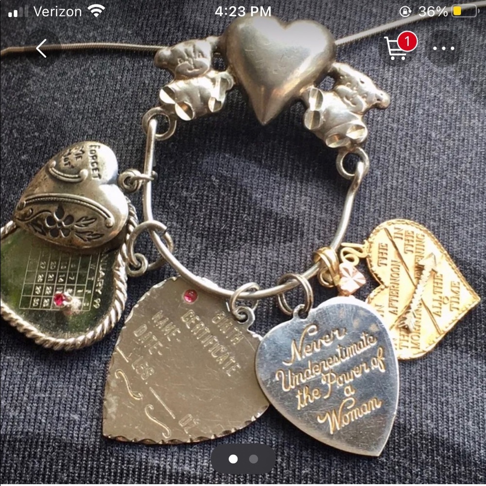 Sterling silver , teddy bear charm holder.